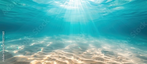 blue tropical ocean underwater background with the summer sun shining © pector