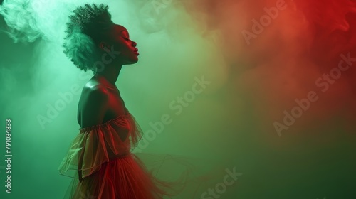  A woman in a red dress stands before a smoky wall, red and green hues intermingling, her head turned to the side