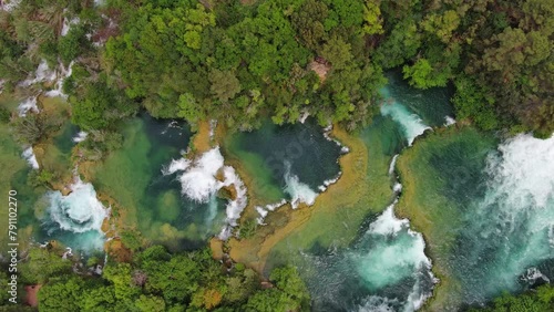 Aerial top view of beautiful Krka Waterfalls in Krka National Park, green foliage and turquoise water, Croatia, 4k photo