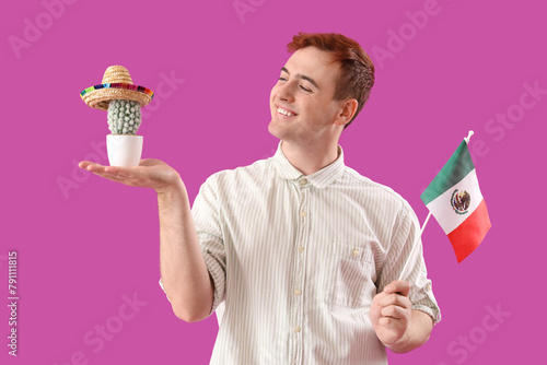 Young man with Mexican flag...