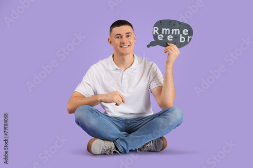 Young man holding speech bu...