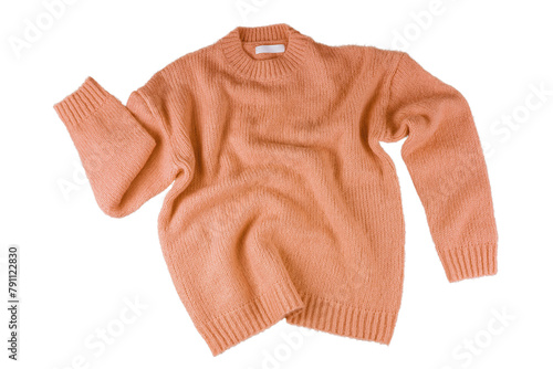 Orange flying crumpled women's autumn knitted sweater isolated on white, transparent background. Creative clothing concept, trendy cozy creasy jersey pullover. Fashion, sale, autumn discount