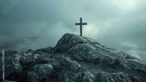 Cross on top of rock photo