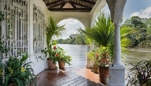 Riverside Colonial Porch with Tropical Plants