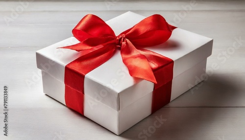 White gift box with red bow . isolated on white background