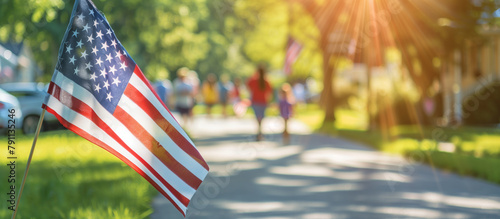 A community celebrating the Fourth of July with an American flag leading the parade, symbolizing national unity and pride. , natural light, soft shadows, with copy space, blurred b