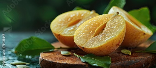 Sliced Citrus Fruits on Wooden Board with Green Leaves Simple Fruit Seed Photo Macro Style photo