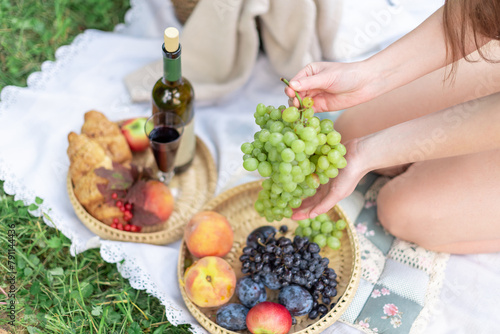 picnic in nature, wine, fruit, grapes, peaches, top view