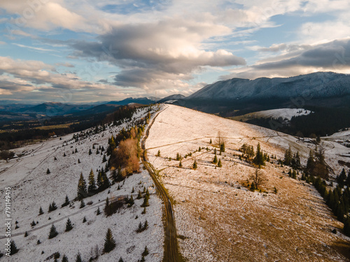 mountain road in the snow drone view