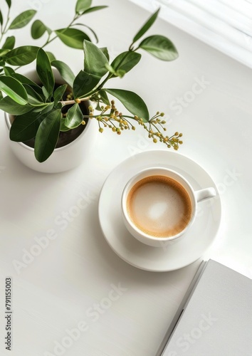 Coffee Cup and Book on Marble Table