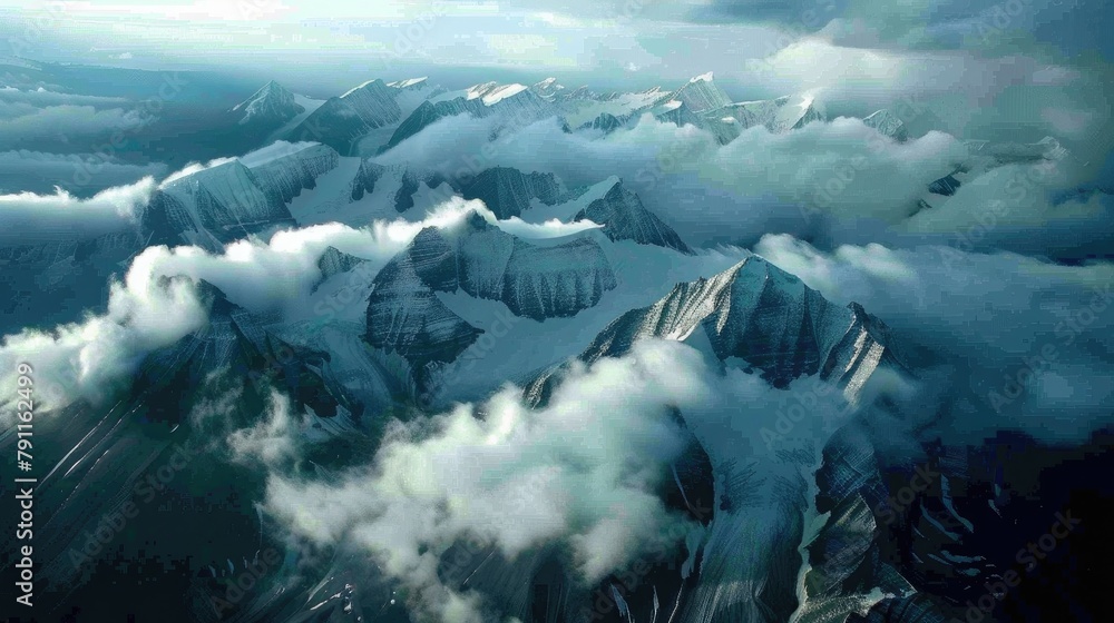Fototapeta premium Cloud covered mountains seen from above