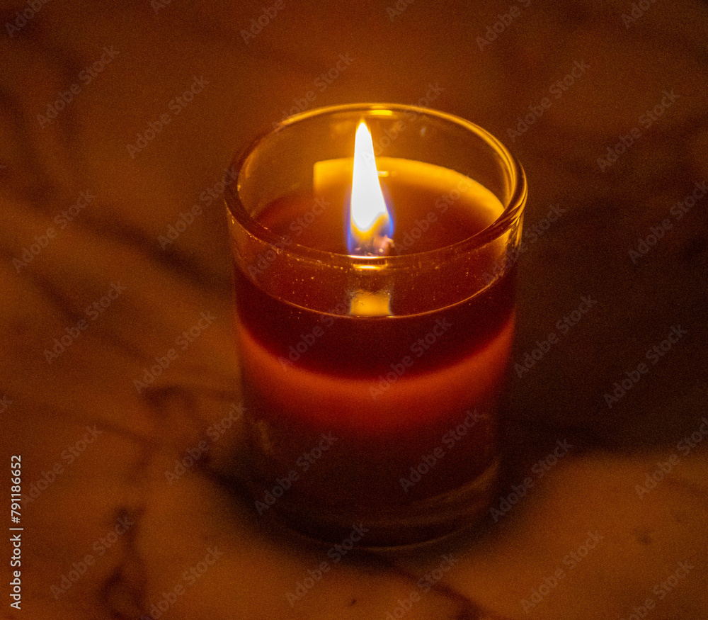 Relaxing and peaceful scene with burning candle Relaxing and peaceful scene with burning candle