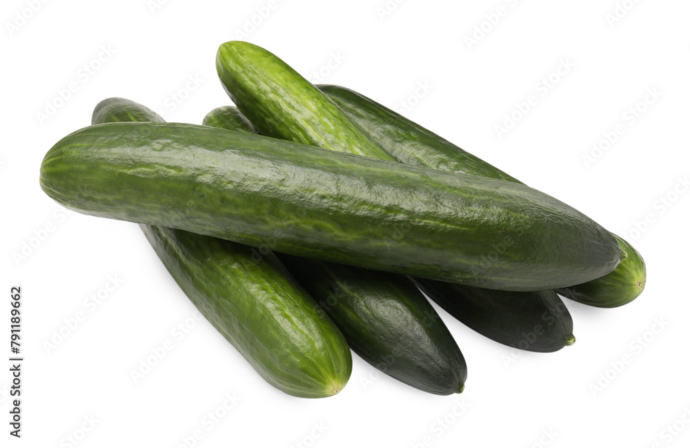 Many long fresh cucumbers isolated on white Many long fresh cucumbers isolated on white