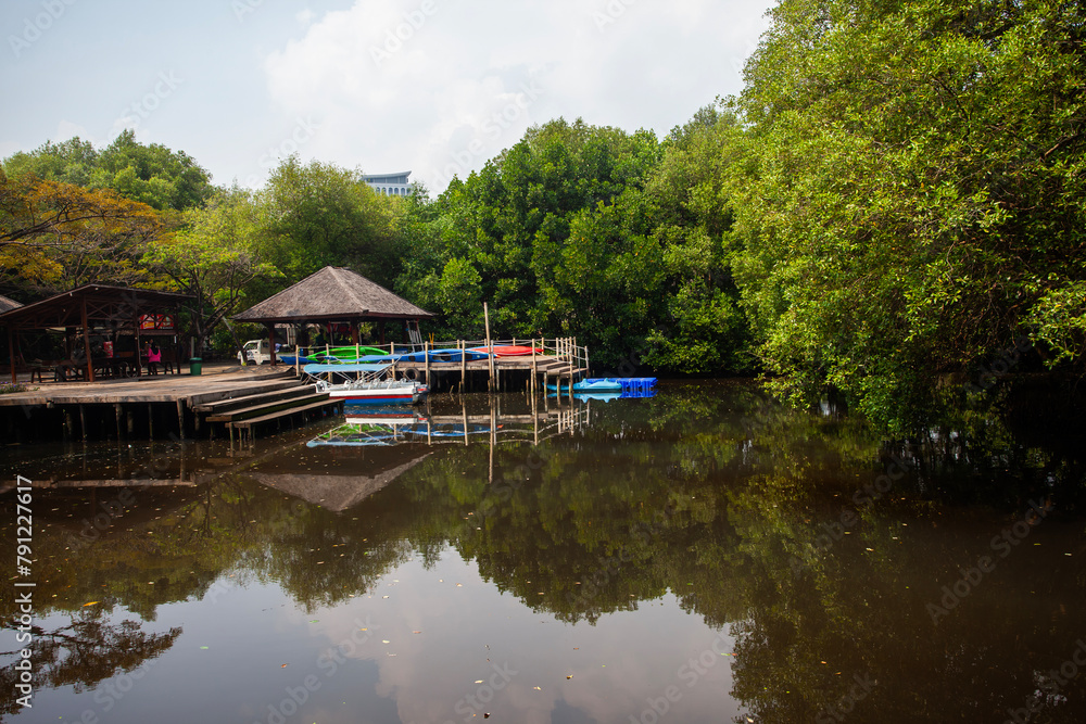 The atmosphere is cool and calming in the Mangrove Nature Tourism Park Area in Muara Angke, Pantai Indah Kapuk, Jakarta. One of the green areas in Jakarta which is also a tourist destination. The atmosphere is cool and calming in the Mangrove Nature Tourism Park Area in Muara Angke, Pantai Indah Kapuk, Jakarta. One of the green areas in Jakarta which is also a tourist destination.