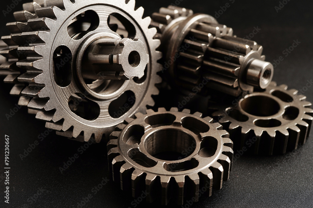Metal gear wheel engine car and bike, mechanic industry concept. Metal gear wheel engine car and bike, mechanic industry concept.