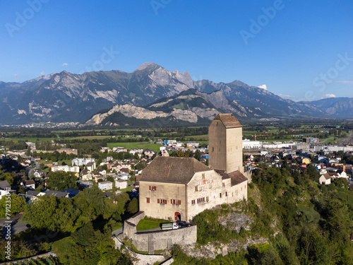 Aerial of the Sargans village and medieval hilltop fortress in Canton Sankt Gallen in eastern Switzerland on a sunny summer day photo