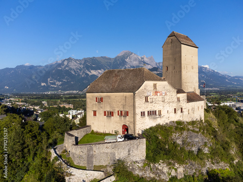 Aerial of the Sargans village and medieval hilltop fortress in Canton Sankt Gallen in eastern Switzerland on a sunny summer day photo