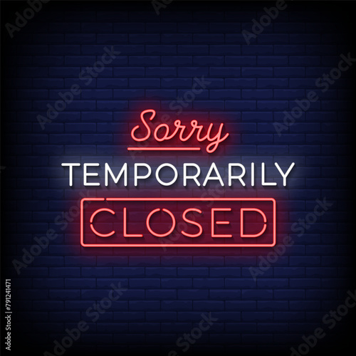 Sorry temporarily closed neon Sign on brick wall background 