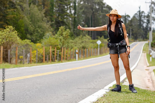Young  Backpacker  woman on the road © Fernando