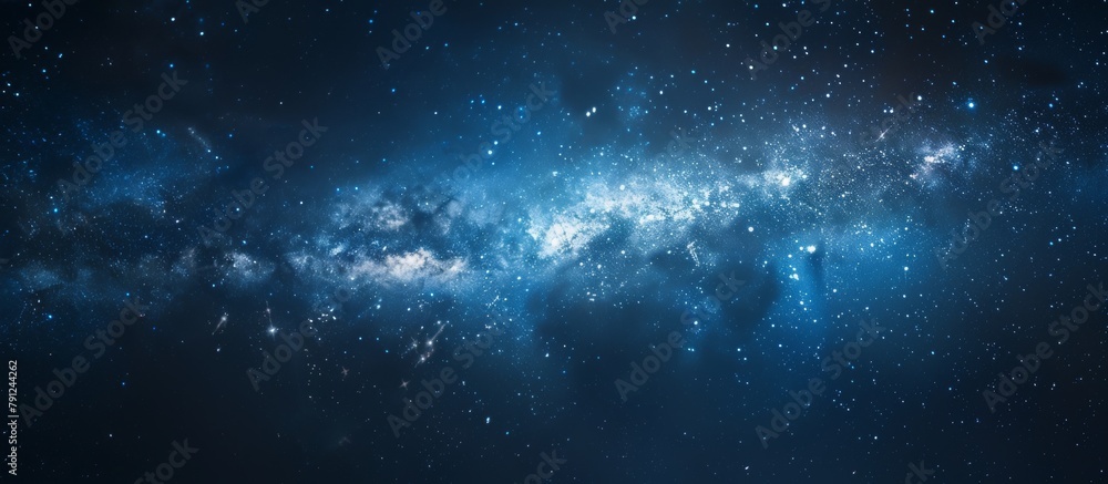 Dark blue sky filled with twinkling stars and a milky-like structure resembling a cosmic cloud Dark blue sky filled with twinkling stars and a milky-like structure resembling a cosmic cloud