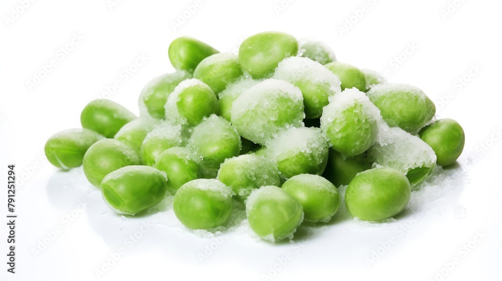 Frozen peas scattered on an isolated white background, focus on the ice crystals and bright green color Frozen peas scattered on an isolated white background, focus on the ice crystals and bright green color