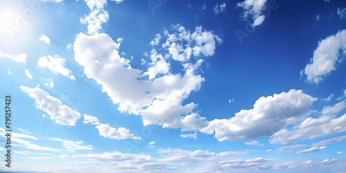 Blue sky with white clouds, panoramic view, wide angle, ultra high definition photography, super resolution, bright and clean sky. This scene is full of tranquility and beauty photo