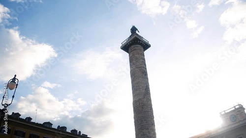 View of the Column of Marcus Aurelius (Italian: Colonna di Marco Aurelio) in the Center of Rome, Italy.  photo
