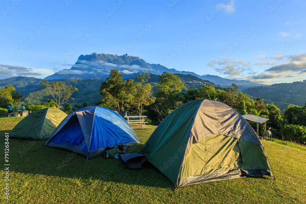 Camping point at morning with mount Kinabalu at far background.