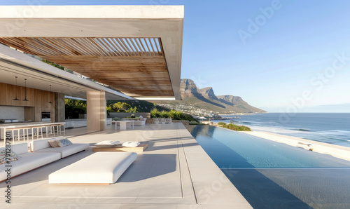 modern house in Cape Town with an infinity pool overlooking the ocean, large open living room with terrace and swimming area © Kien
