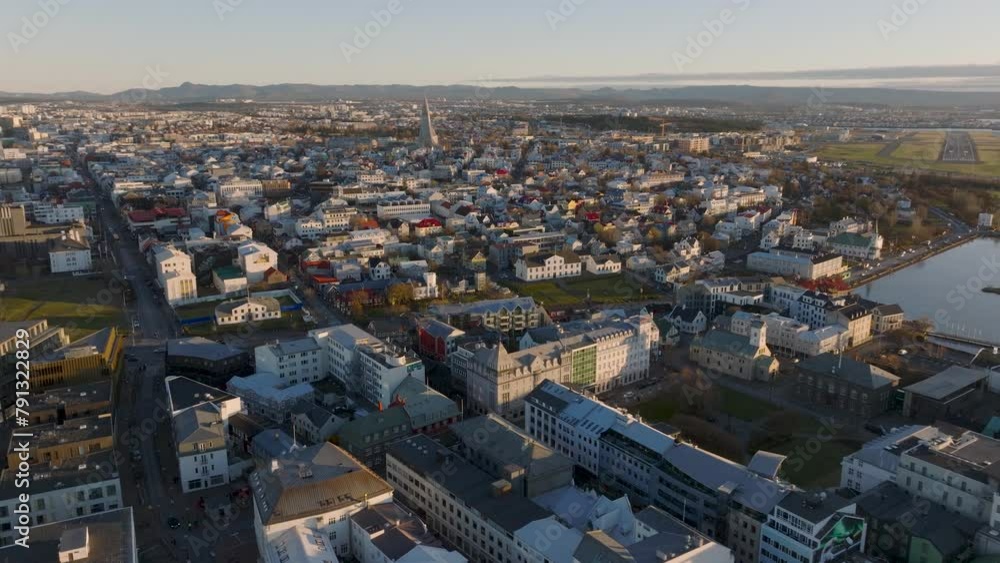 Travel destination Reykjavik with Hallgrimskirkja church during golden hour Travel destination Reykjavik with Hallgrimskirkja church during golden hour
