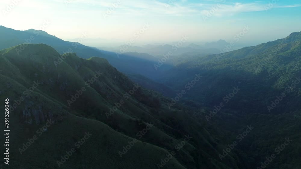 Aerial drone landscape view of scenic mountain range rolling hills with early morning nature sunrise vegetation Ella Sri Lanka Asia travel tourism Aerial drone landscape view of scenic mountain range rolling hills with early morning nature sunrise vegetation Ella Sri Lanka Asia travel tourism