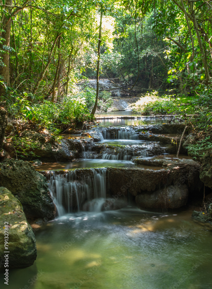 Waterfall along a tropical river in Thailand Waterfall along a tropical river in Thailand