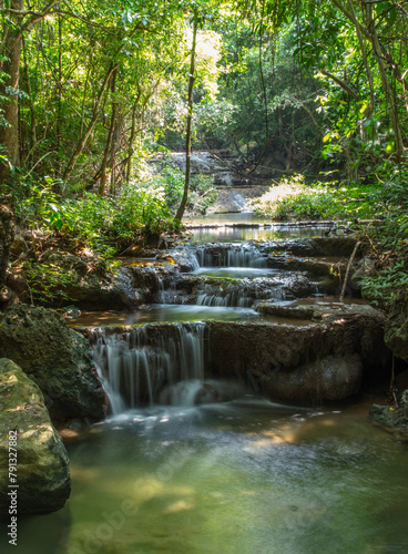 Waterfall along a tropical river in Thailand