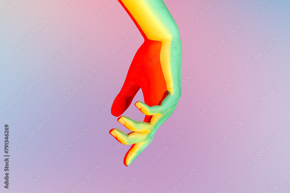 Obraz premium Illuminated hand with vivid colors on blurred background