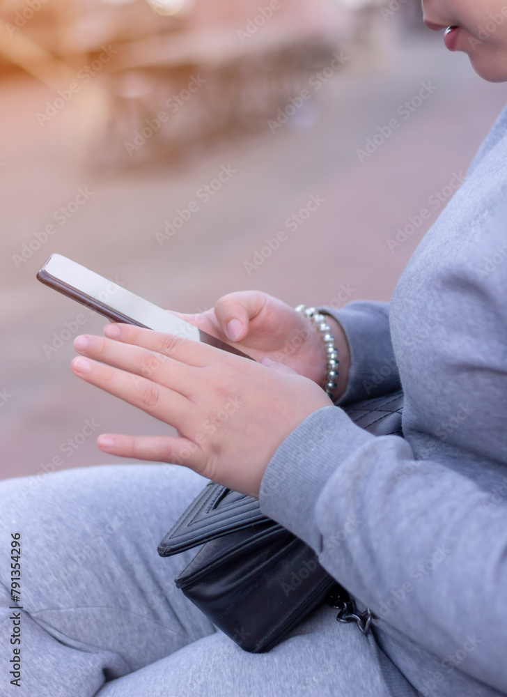 Women using smart phone mobile on soft blurred