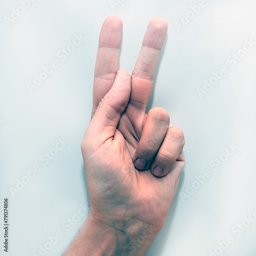 Letter K in American Sign Language (ASL) for deaf people