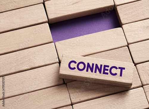 The word connect on wooden blocks. Making a connection and bridging the gap.