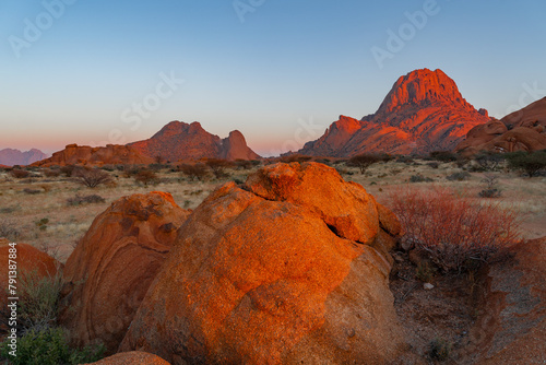 Spitzkoppe, aka Sptizkop - unique rock formation of pink granite in Damaraland landscape, Namibia, Africa.
