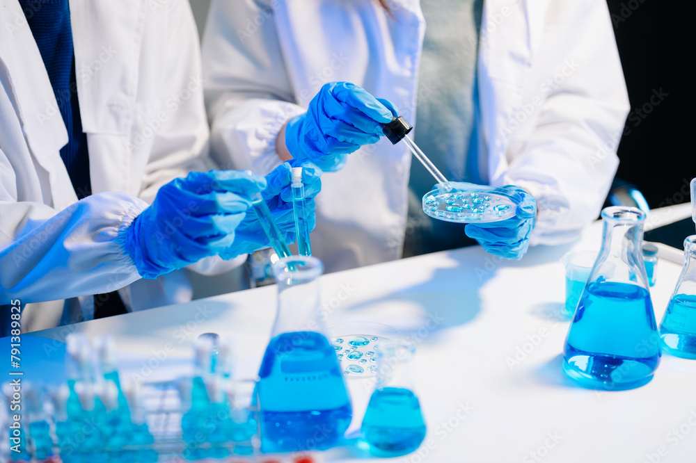 Fototapeta premium Scientist team meeting and writing analysis results in the laboratory study and analyze scientific