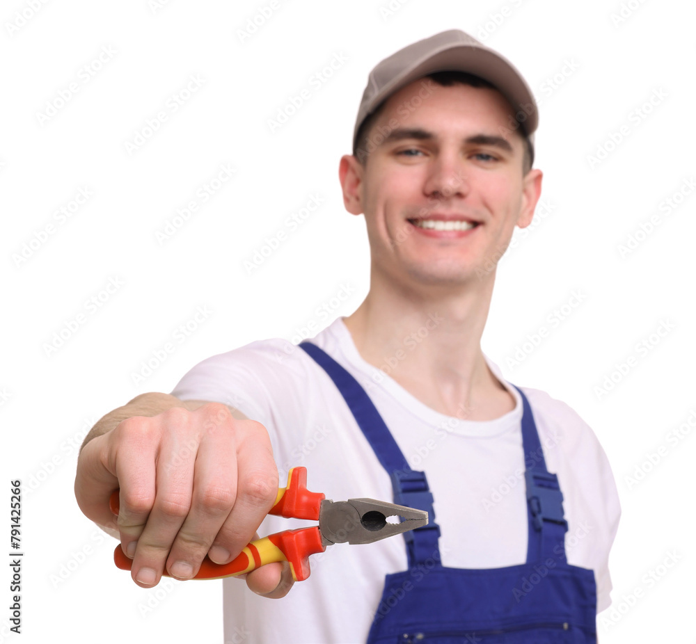 Young man holding pliers on white background Young man holding pliers on white background