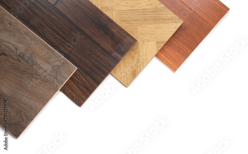 Different samples of wooden flooring isolated on white, top view