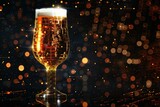 Glass of beer with bokeh lights on dark background, celebration concept