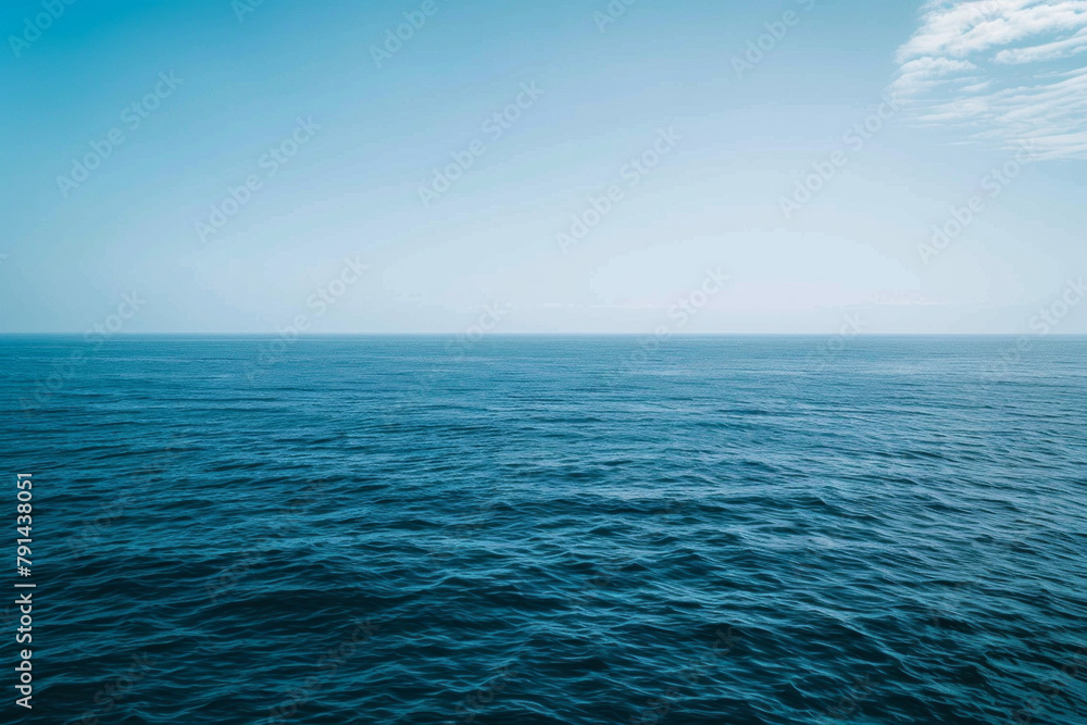 The vastness of the ocean stretching out to the horizon, with just the line where the sea meets the sky in the frame. The vastness of the ocean stretching out to the horizon, with just the line where the sea meets the sky in the frame.