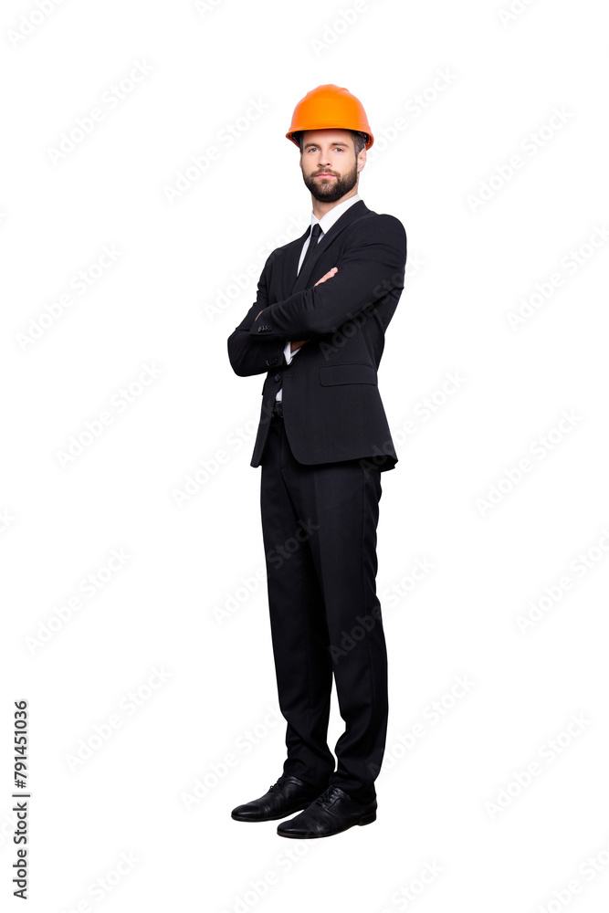 Full length size portrait of attractive beardedstylish investor in hard hat, black tux, tuxedo with tie, isolated on grey background, having his arms crossed Full length size portrait of attractive beardedstylish investor in hard hat, black tux, tuxedo with tie, isolated on grey background, having his arms crossed