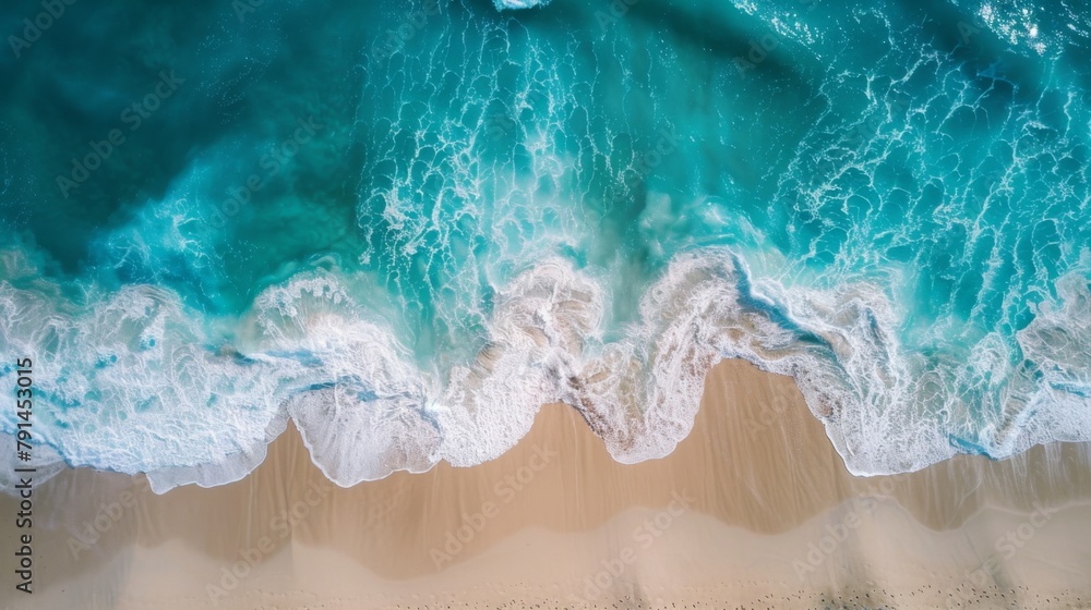 Beautiful beach with turquoise water and waves from above, top view