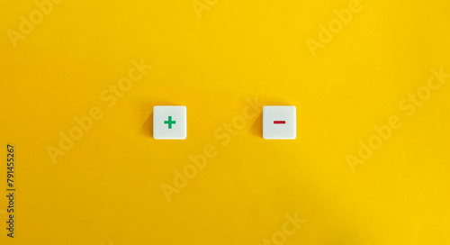 Bild auf Leinwand Green Plus Sign and Red Minus Sign