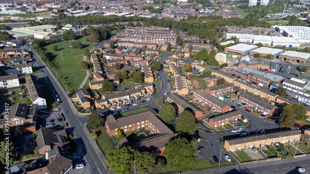 Aerial photo of the village of the town of Hunslet in Leeds West Yorkshire in the UK, showing roads and rows of residential houses, taken in the summer time. Aerial photo of the village of the town of Hunslet in Leeds West Yorkshire in the UK, showing roads and rows of residential houses, taken in the summer time.