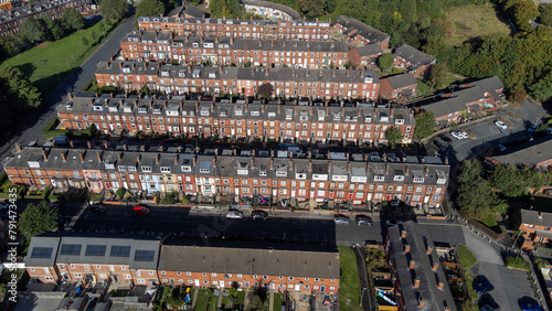 Aerial photo of the village of the town of Hunslet in Leeds West Yorkshire in the UK, showing roads and rows of residential houses, taken in the summer time.