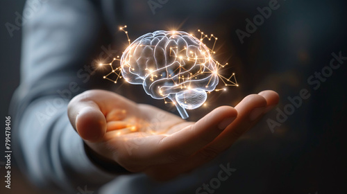 Hologram Brain is floating on Businessman Hand with digital connections and dots, Artificial Intelligent Concept, Education knowledge 