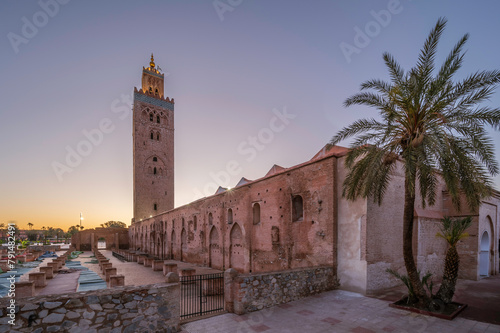 12th century Koutoubia Mosque at sunrise, Marrakesh, Morocco. Outside the Mosque are ruins of the original mosque
